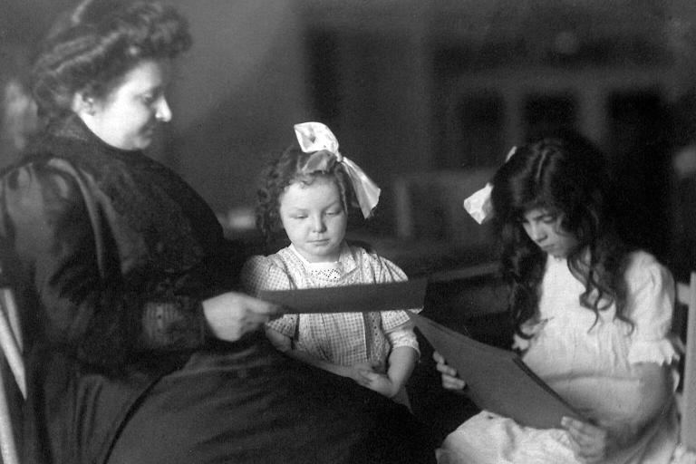 Maria Montessori with children