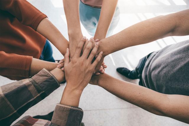 Group circle joining hands